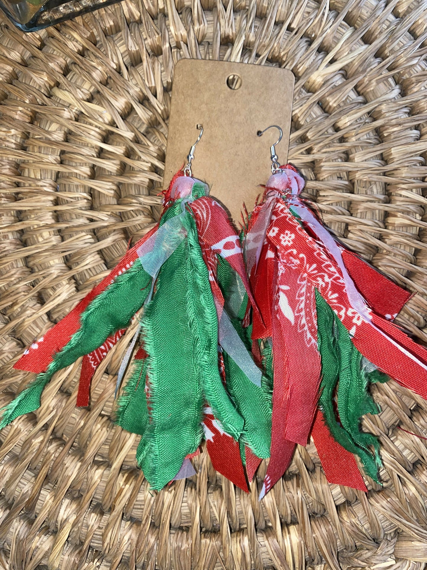 Red bandana and green earrings