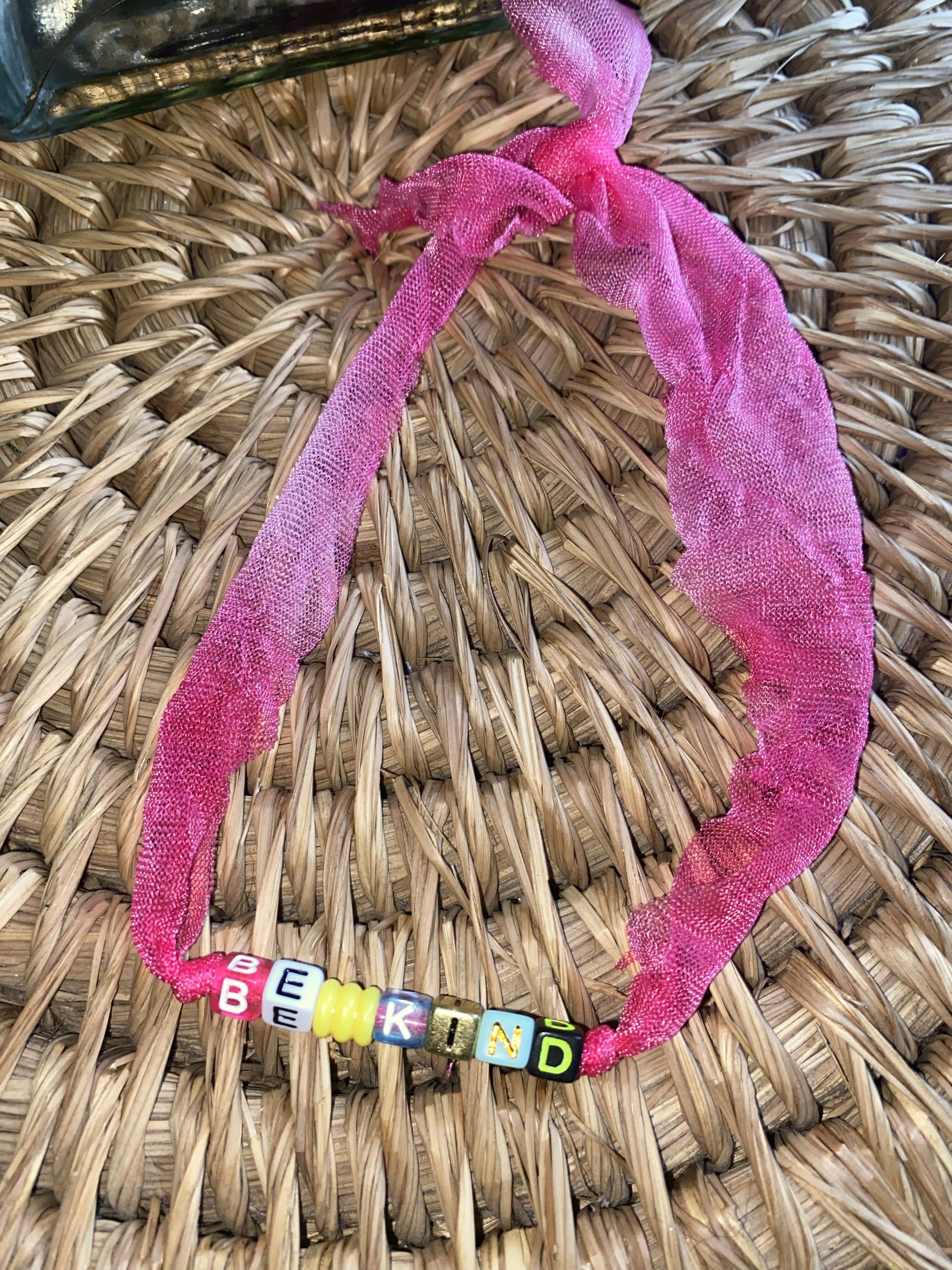 Be Kind pink stretchy necklace