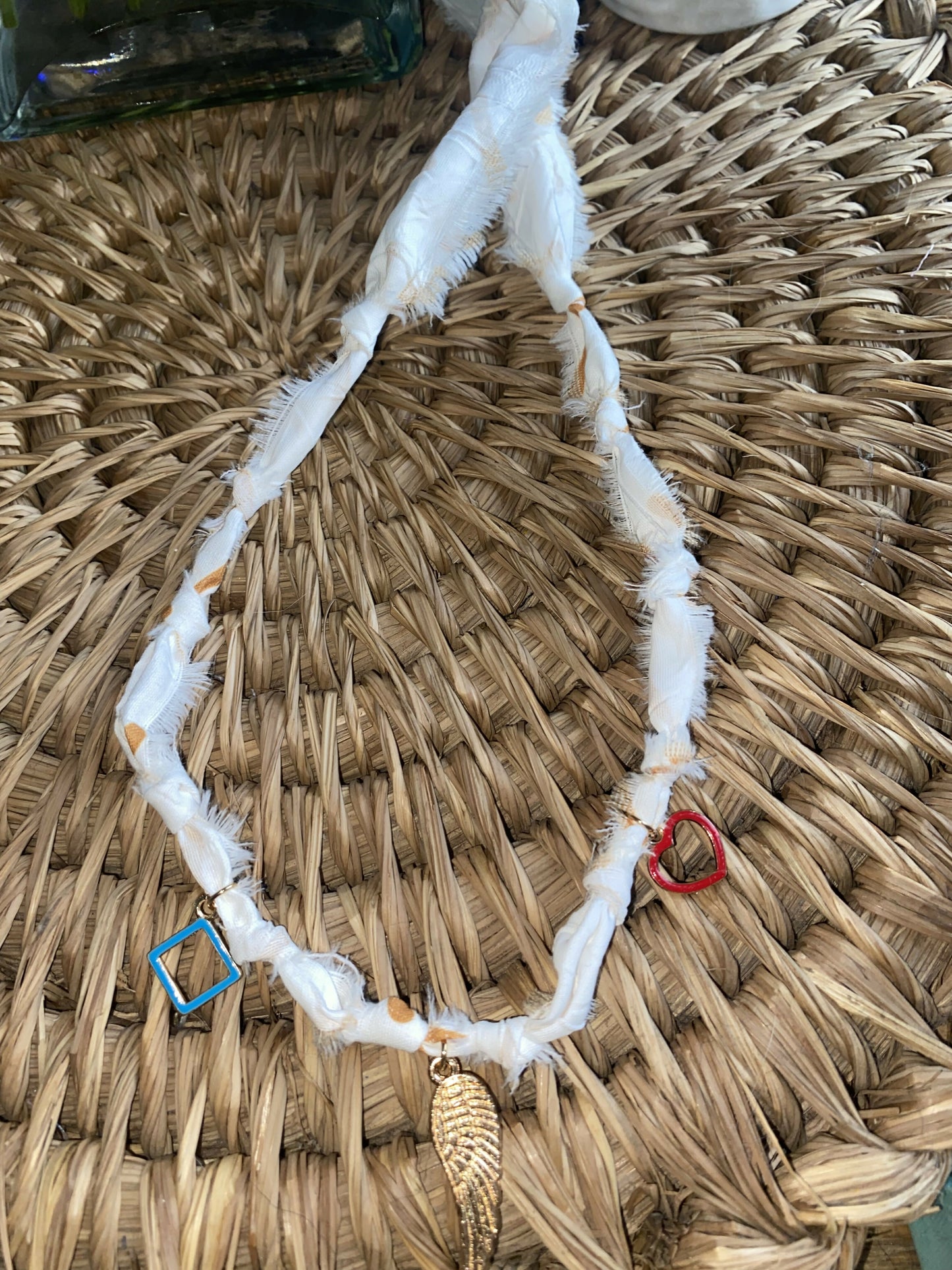 Angel wing charm necklace