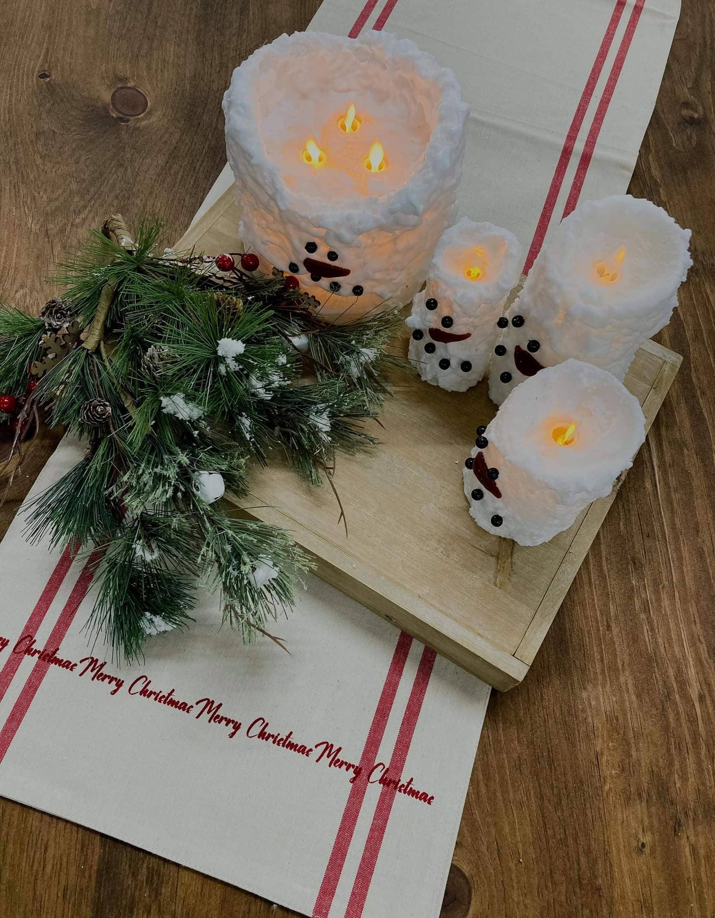 Snowman moving flame candle