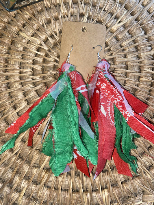 Red bandana and green earrings