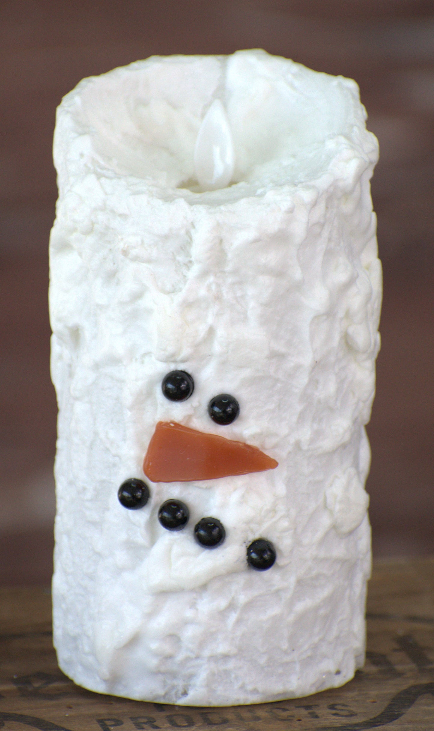 Snowman moving flame candle