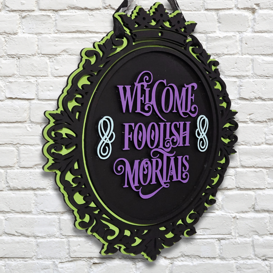 Welcome Foolish Mortals Door Hanger